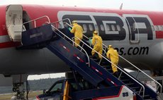 MAIQUETIA, Oct. 15, 2014 (Xinhua) -- Venezuelan Health Ministry officials drill to deal with Ebola infected people at Simon Bolivar International Airport in Maiquetia, Oct. 14, 2014