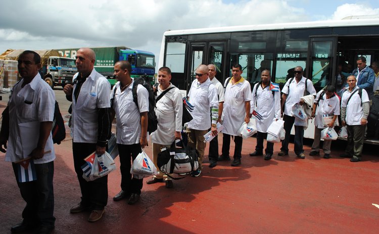 MONROVIA, Oct. 22, 2014 (Xinhua) -- Cuban health care workers arrive at the Roberts International Airport in Monrovia, capital of Liberia, on Oct. 22, 2014. 
