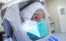 GUANGZHOU, Oct. 23, 2014 (Xinhua) -- A medical worker takes part in a drill to deal with Ebola cases at the Guangzhou Eighth People's Hospital in Guangzhou, capital of south China's Guangdong Province