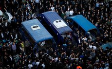 JERUSALEM, Nov. 19, 2014 (Xinhua) -- A funeral of the victims near the scene of the attack at a synagogue in the Har N, Jerusalem, on Nov. 18, 2014. 