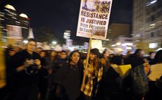 NEW YORK, Nov. 26, 2014 (Xinhua) -- People gather for a Ferguson protest in New York Nov. 25, 2014. 