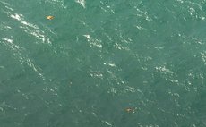 BANGKA-BELITUNG, Dec. 30, 2014 (Xinhua) -- Photo taken on Dec. 30, 2014 from a plane of Indonesian Air Force shows floating objects in waters near Bangka-Belitung and Kalimantan, Indonesia. 