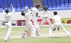 India celebrate taking another West Indies wicket