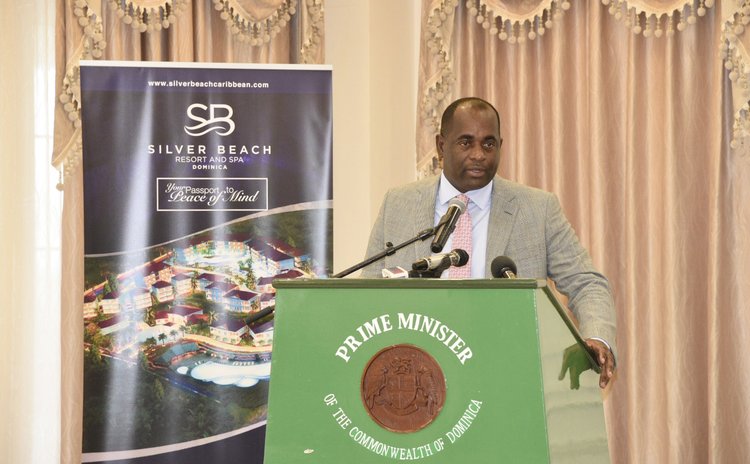 Prime Minister Roosevelt Skerrit speaks at signing ceremont of three resorts at the State House