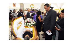 President Charles Savarin at the funeral of Alex Phillip, the late Clerk of the House of Assembly