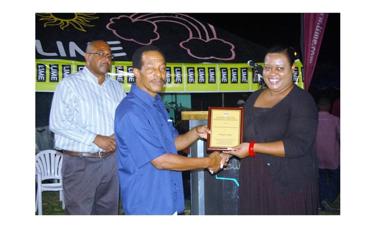 James receiving plaque presented by LIME's Ferdina Frampton on behalf of DABA President Mickey Joseph (L), 2012 