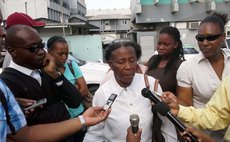 A relative of the deceased man speaks to the press