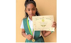 Aliane Challenger shows her awards