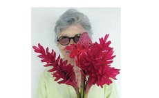 Anne Winn with a bunch of flowers