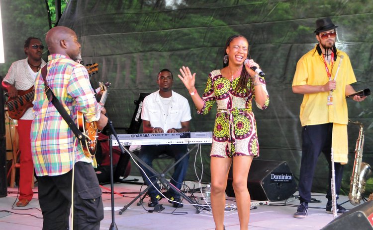 At the 2016 Jazz and Creole Festival  2016: Michele Henderson and Cameron Pierre (centre and left) perform