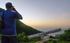 Arlington James of the Forestry, Wildlife and Parks Division conducting a radar survey on the western slopes of Morne Anglais, Dominica