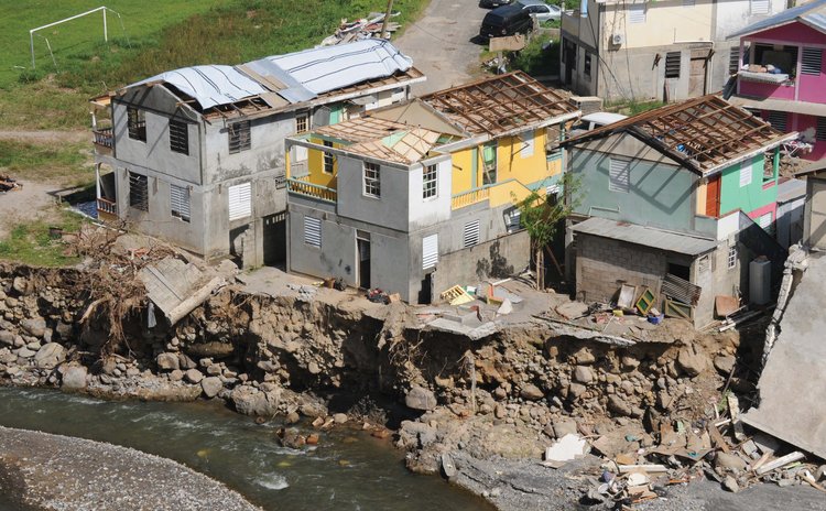 Damaged houses near Bath Estate after Hurricane Maria