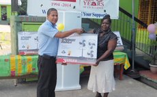 Auto Trade official make presentation to Massacre school