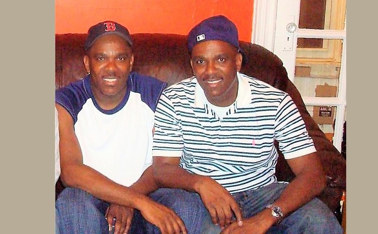 Jean (L) and Joshua Etienne, retired identical twin basketballers. Circa 2011