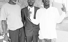 Bedminister, right, and his lawyer Tiyani Biyanzin; Bedminister Senior, left
