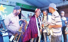 Dice, centre, at the 2019 Calypso Finals