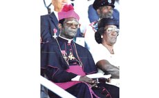 Cardinal Felix (left front) at a National Day event in 1999