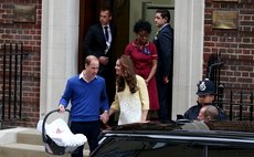 Prince William (R), his wife, the Duchess of Cambridge and their new daughter are seen in front of the Lindo Wing of St Mary's Hospital in London, Britain on May 2, 2015