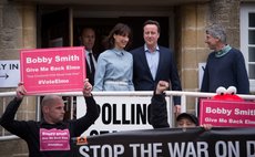 David Cameron, British Prime Minister and leader of the Conservative Party and wife leaves polling station