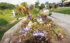 A newly dug grave at the Roseau Catholic cemetery