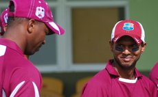 Chanderpaul shares a smile with a teammate