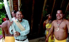 Chief Charles Williams with the Queen's Baton in 2005