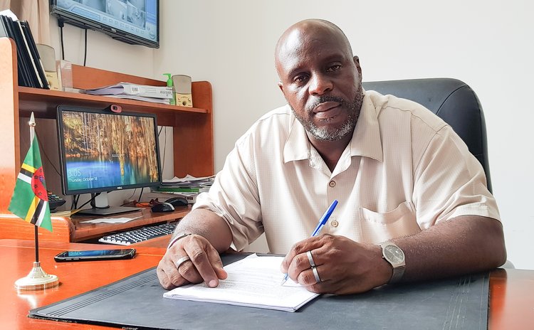 At his desk-Ian Anthony, Chief Elections Officer