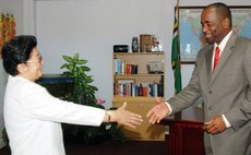 File Photo: PM Skerrit meets Chinese official in 2007 at his office