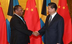 Chinese President Xi Jinping (R) meets with Bahamas Prime Minister Perry Christie in Beijing, capital of China, Jan. 7, 2015. (Xinhua/Liu Weibing)