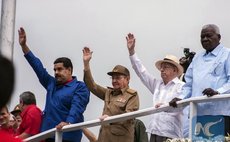 Cuba's President, Raul Castro (2nd L), and his Venezuela's counterpart, Nicolas Maduro (1st L), attend a May Day parade in Havana, Cuba, on May 1, 2015. (Xinhua/Joaqin Hernandez)