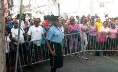 Crowd watch as accused police officers are taken to court