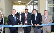 Cutting ribbon at the opening of New Student Centre at Ross Unioversity