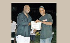 DABA-DBOA Referee Leroy Dover (R) being recognized by DABA President Dave Baron, for long service as a basketball official.   Photo Courtesy: Mickey Joseph