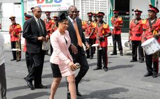 Prime Minister Skerrit and Mrs Skerrit aon their way to parliament for the delivery of the budget address on Wednesday 23 July 2014