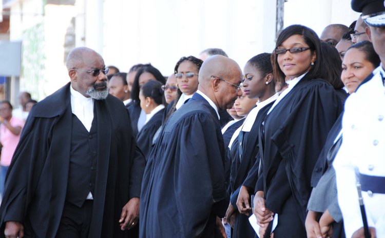 Judge Errol Thomas,lawyers and other officials at the opening of Law Year