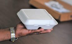 Man holding plastic food container