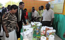 President and Mrs Savarin and DPP manager Severin at an exhibition at the Sports Stadium