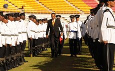 President Charles Savarin inspect the parade