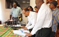 Officials sign field lighting agreement