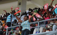 Fans enjoy cricket at the Windsor Park Stadium