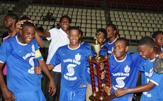 Newtown Juvenile Football Academy (White and Black uniform) plays the Bath Estate Football Club (Blue and White uniform) in the Finals of the DFA All Island League on Saturday 5 June 2016. 