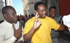 Carlisle Jno Baptiste, right and Curtis Matthew interview a reluctant Webb after a court trial