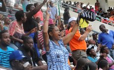 She's really into it! Spectators at the Windsor Park