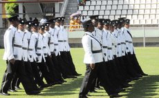 Police march during the Parade of Uniformed Groups at the 2015 Independence Day ceremony at the Windsor Park Stadium on November 3rd 2015