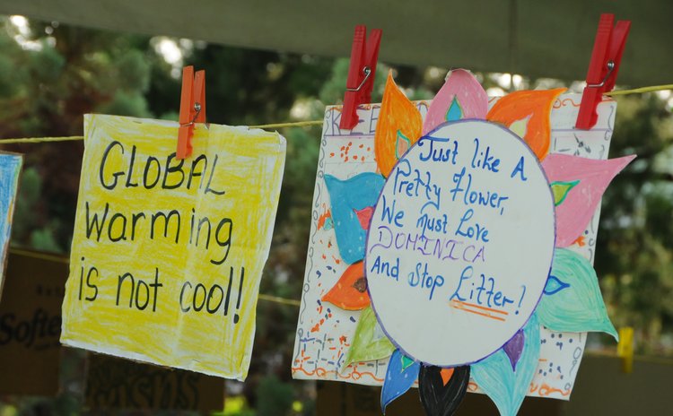 Signs at the Dominica Climate Change Day of Action at the Botanic Gardens, Roseau on Saturday November 28, 2015