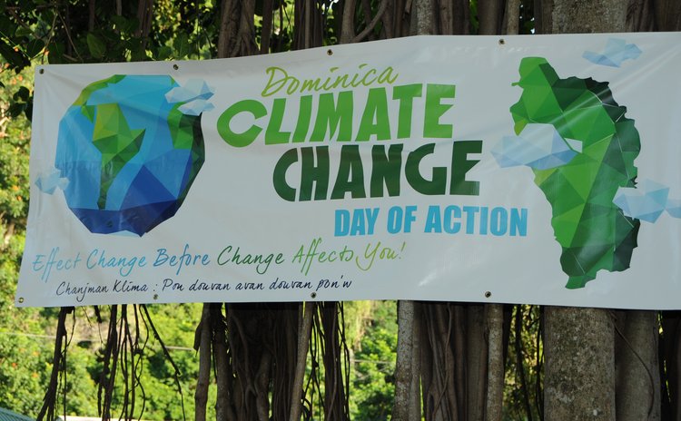 Sign at the Dominica Climate Change Day of Action at the Botanic Gardens, Roseau on Saturday November 28, 2015
