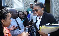 Defence Lawyer Shillingford talk to reporters after the case at the St. Joseph Magistrate's court on 8th December 2015