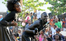 Dominican Mas at its darkest best- on the Roseau Bayfront