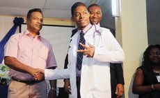 All Saints Dominican student receives white coat 