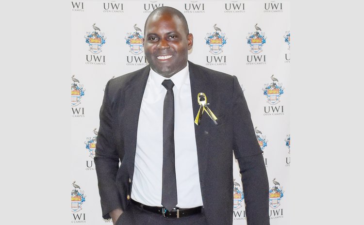 Dr. Barry Casimir at a UWI official function
